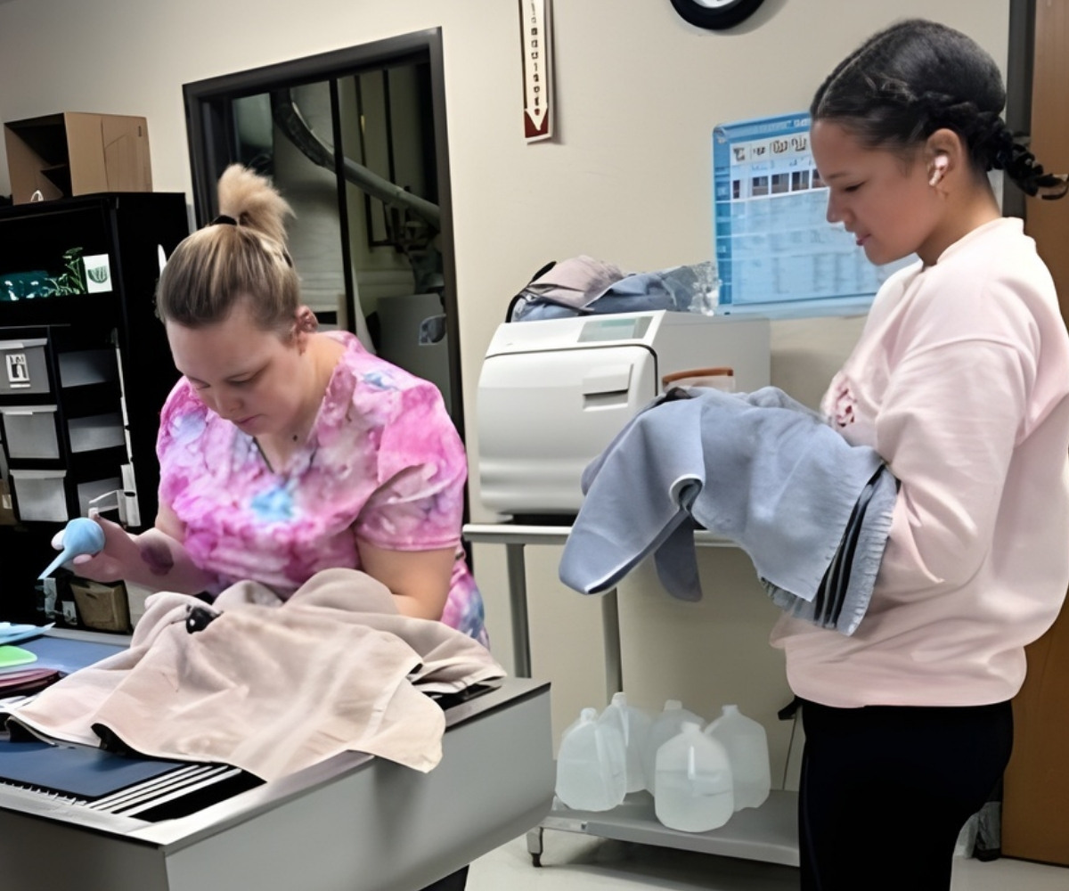 Dog-sits-happily-wear-surgical-cone